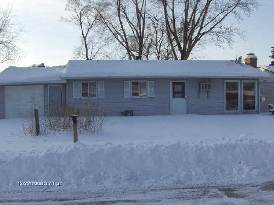 7710 Randy Road Machesney Park, IL 61115 - Photo 1 of 1 a view of house with yard and sitting area