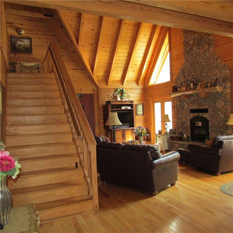 189 Upper Service Road Hookstown, PA 15050 - Photo 12 of 25 All wood staircase and railing from the main floor to upper.