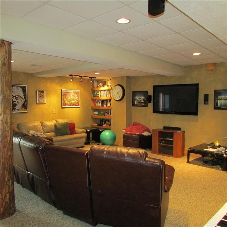 189 Upper Service Road Hookstown, PA 15050 - Photo 21 of 25 Lower level finished game room with exercise room. Radiant floor heating in lower level and garage.
