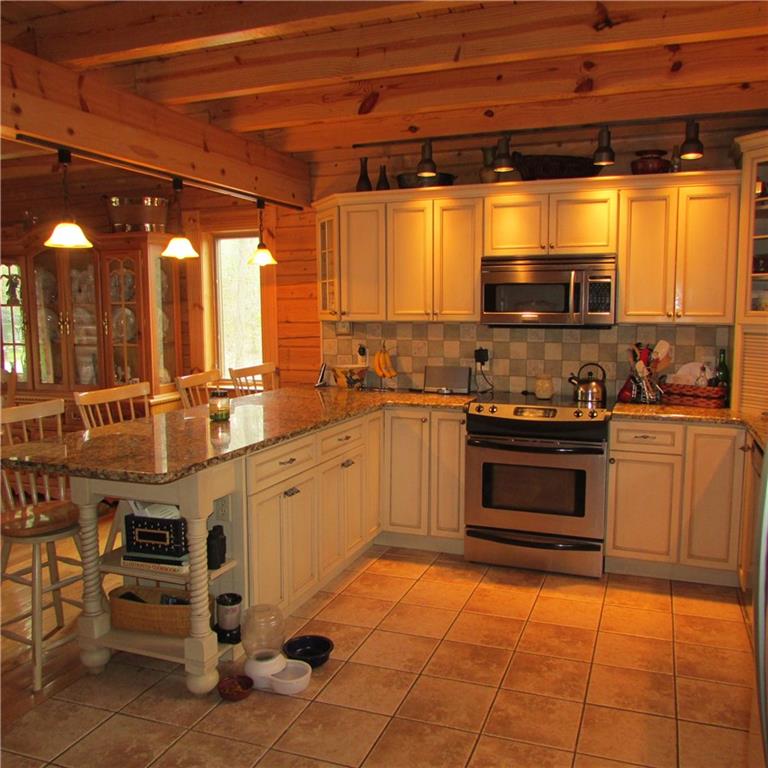 189 Upper Service Road Hookstown, PA 15050 - Photo 6 of 25 Stainless steel appliances. Granite counter tops. Tile backsplash. Eat in kitchen and open to dining room.