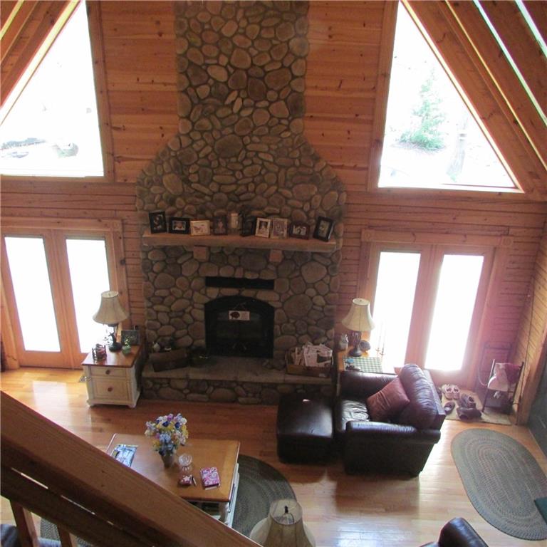 189 Upper Service Road Hookstown, PA 15050 - Photo 9 of 25 All stone woodburning fireplace. Pella Windows and doors throughout the home.