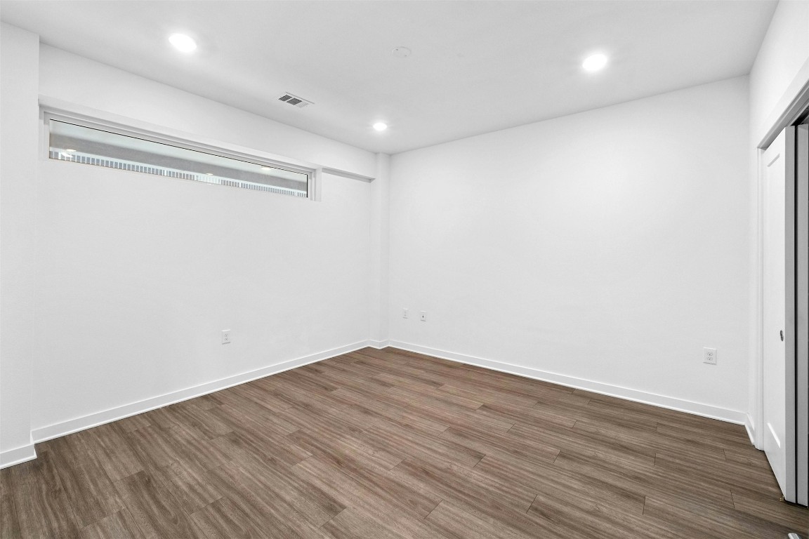 4361 South Congress Avenue, Unit 333 Austin, TX 78745 - Photo 22 of 40 a view of a room with wooden floor