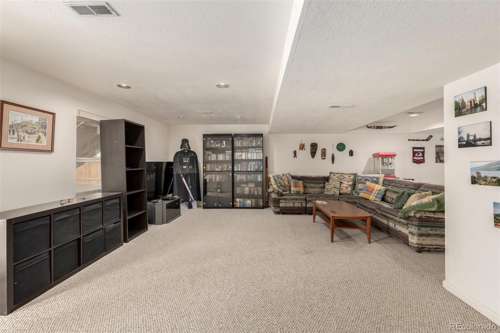 707 Huntington Place Highlands Ranch, CO 80126 - Photo 29 of 50 a view of a livingroom with workspace and a couch