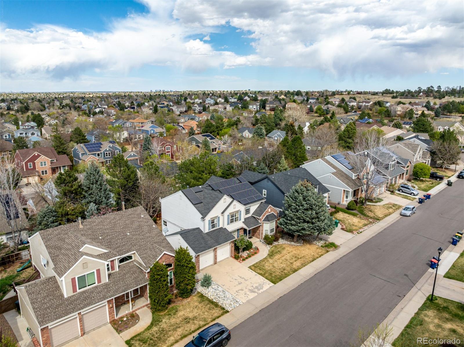 707 Huntington Place Highlands Ranch, CO 80126 - Photo 48 of 50 an aerial view of a house with a lot of residential buildings