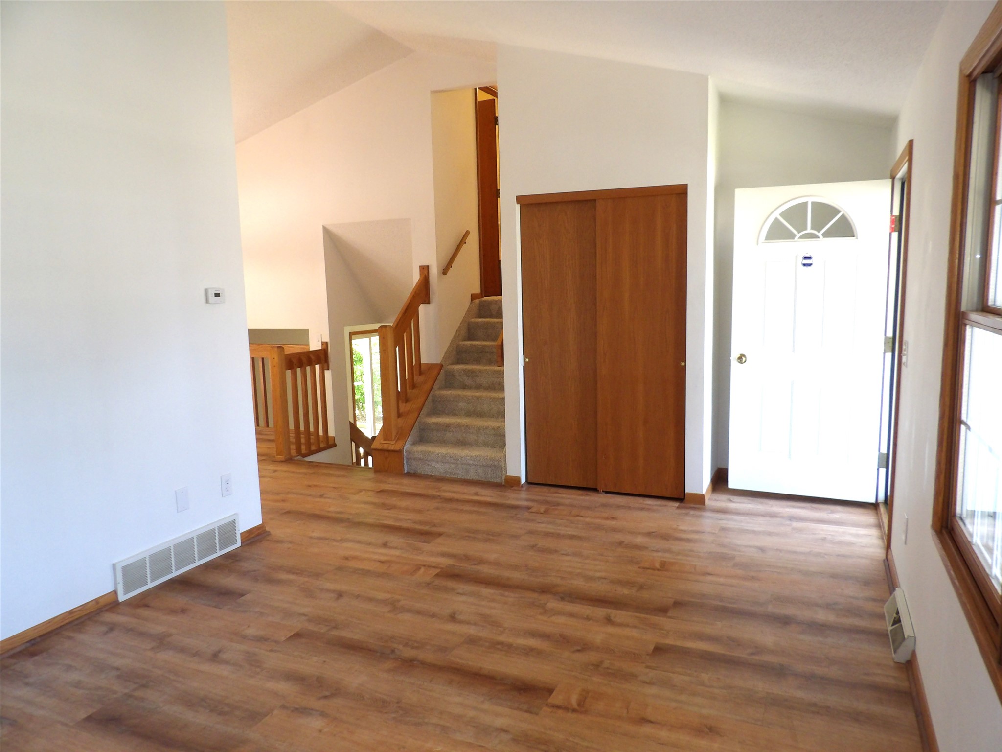 5213 La Rae Drive Erie, PA 16506 - Photo 6 of 46 Nice sized entry closet and stairs to the upper and lower levels.