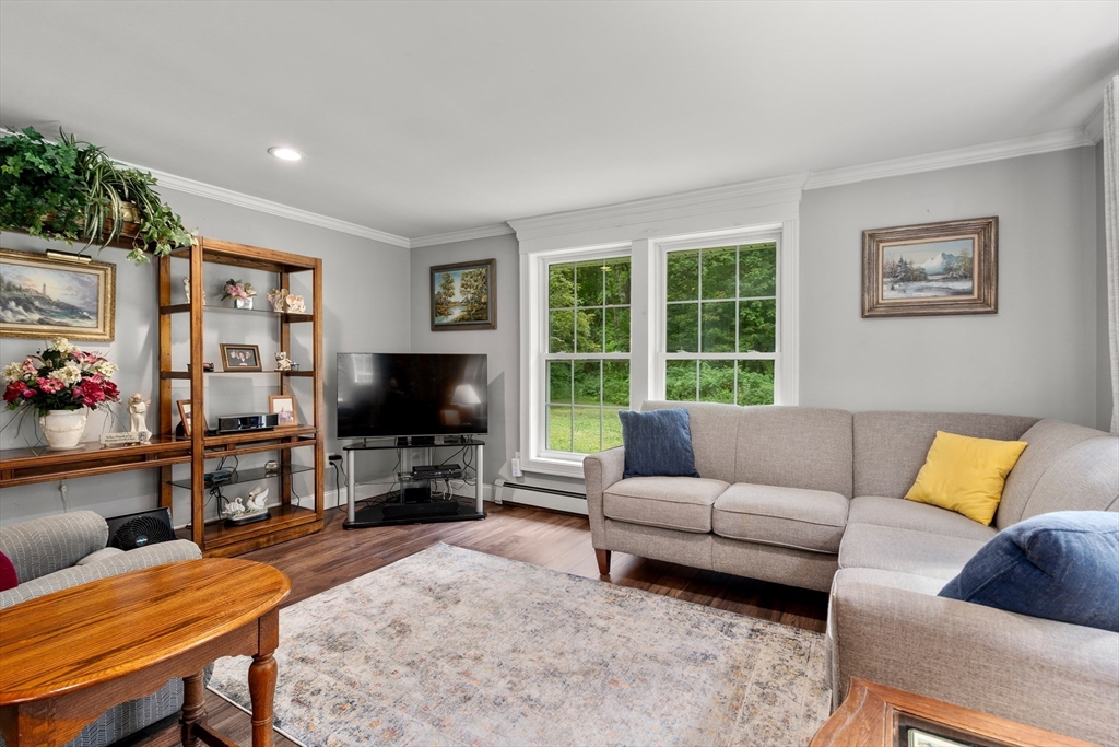 1 Sunset Rock Road Wilbraham, MA 01095 - Photo 11 of 24 a living room with furniture and a flat screen tv