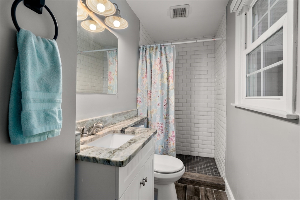 1 Sunset Rock Road Wilbraham, MA 01095 - Photo 16 of 24 a bathroom with a sink a toilet and shower