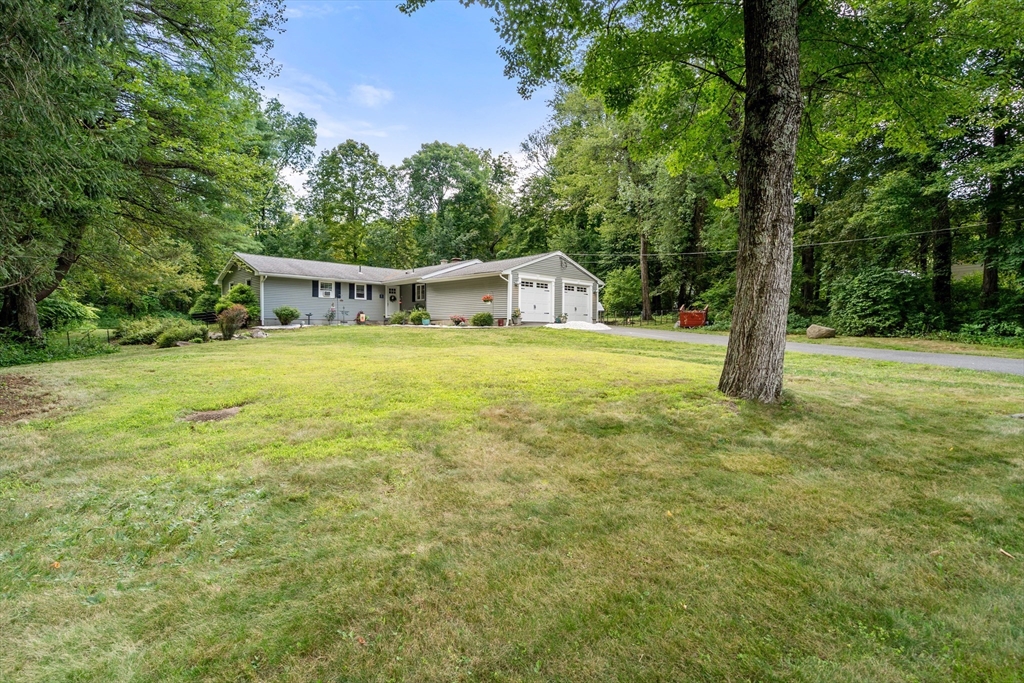 1 Sunset Rock Road Wilbraham, MA 01095 - Photo 3 of 24 a front view of a house with a yard