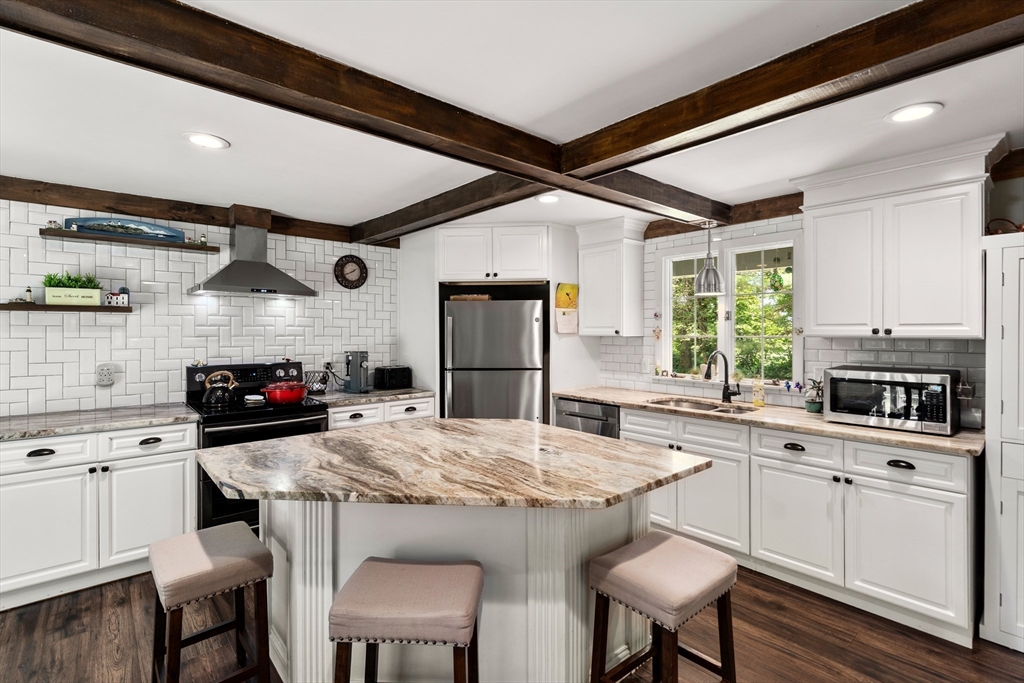1 Sunset Rock Road Wilbraham, MA 01095 - Photo 7 of 24 a kitchen with a sink stove and refrigerator