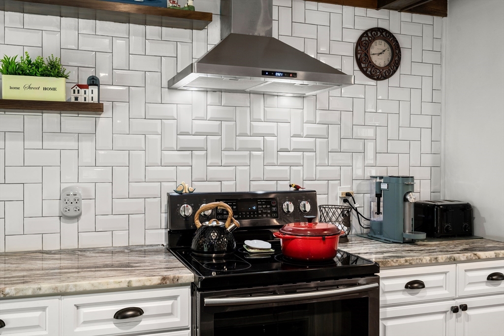 1 Sunset Rock Road Wilbraham, MA 01095 - Photo 8 of 24 a kitchen with a stove and a granite counter tops