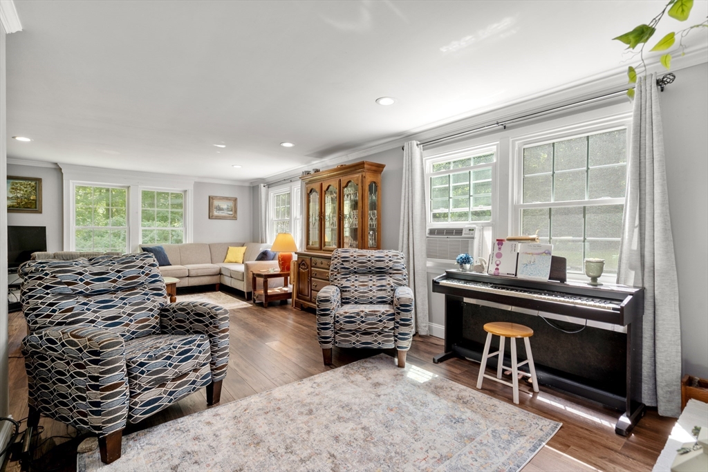 1 Sunset Rock Road Wilbraham, MA 01095 - Photo 9 of 24 a bedroom with furniture and a fireplace