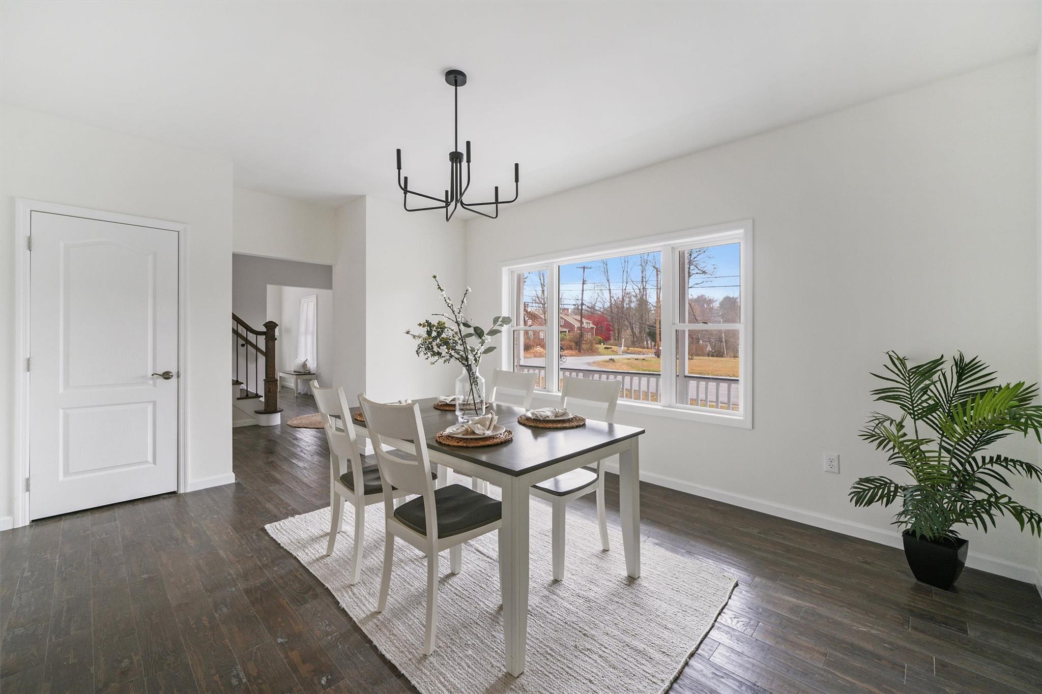 2685 Gregory Street Yorktown Heights, NY 10598 - Photo 19 of 35 Dining area with dark hardwood / wood-style floors and a chandelier