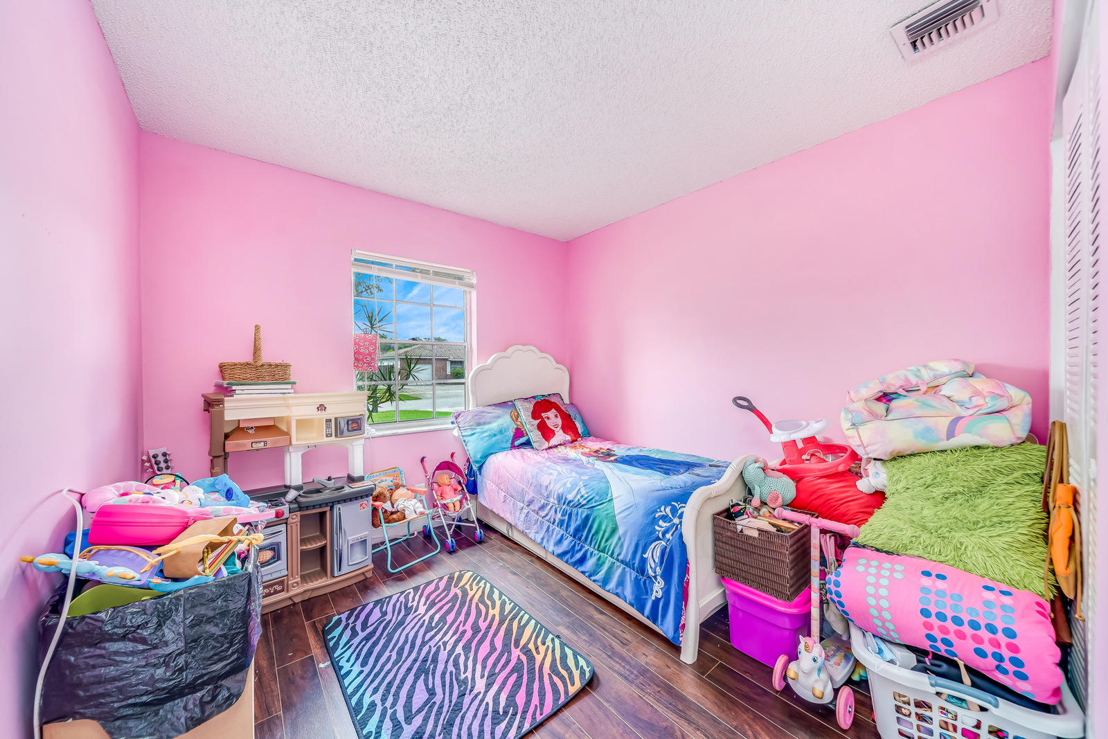 19322 Delaware Court Boca Raton, FL 33434 - Photo 23 of 43 a bedroom with furniture and a baby crib