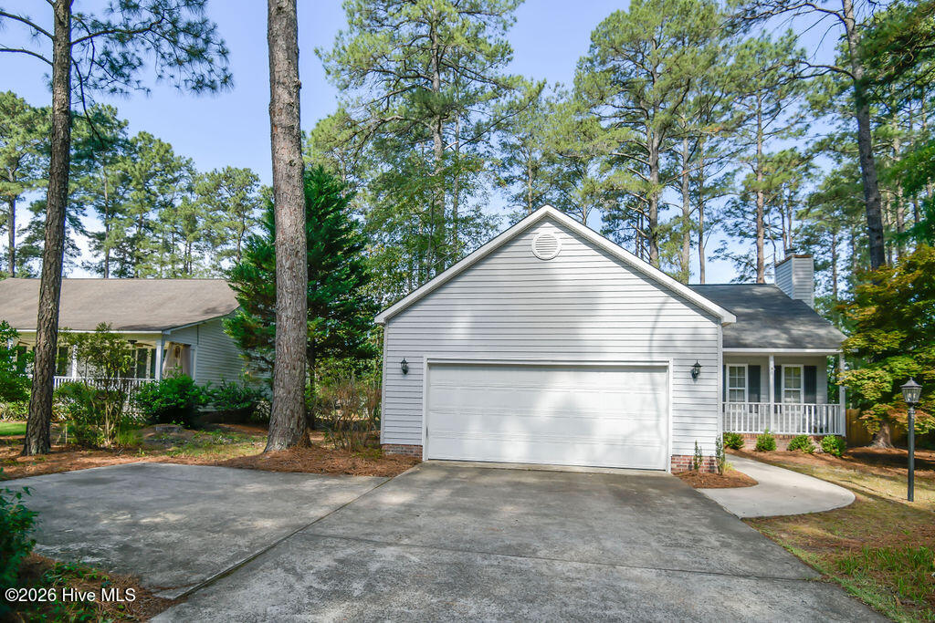 2545 Longleaf Drive Southwest Pinehurst, NC 28374 - Photo 24 of 30 single level home with 2 car garage