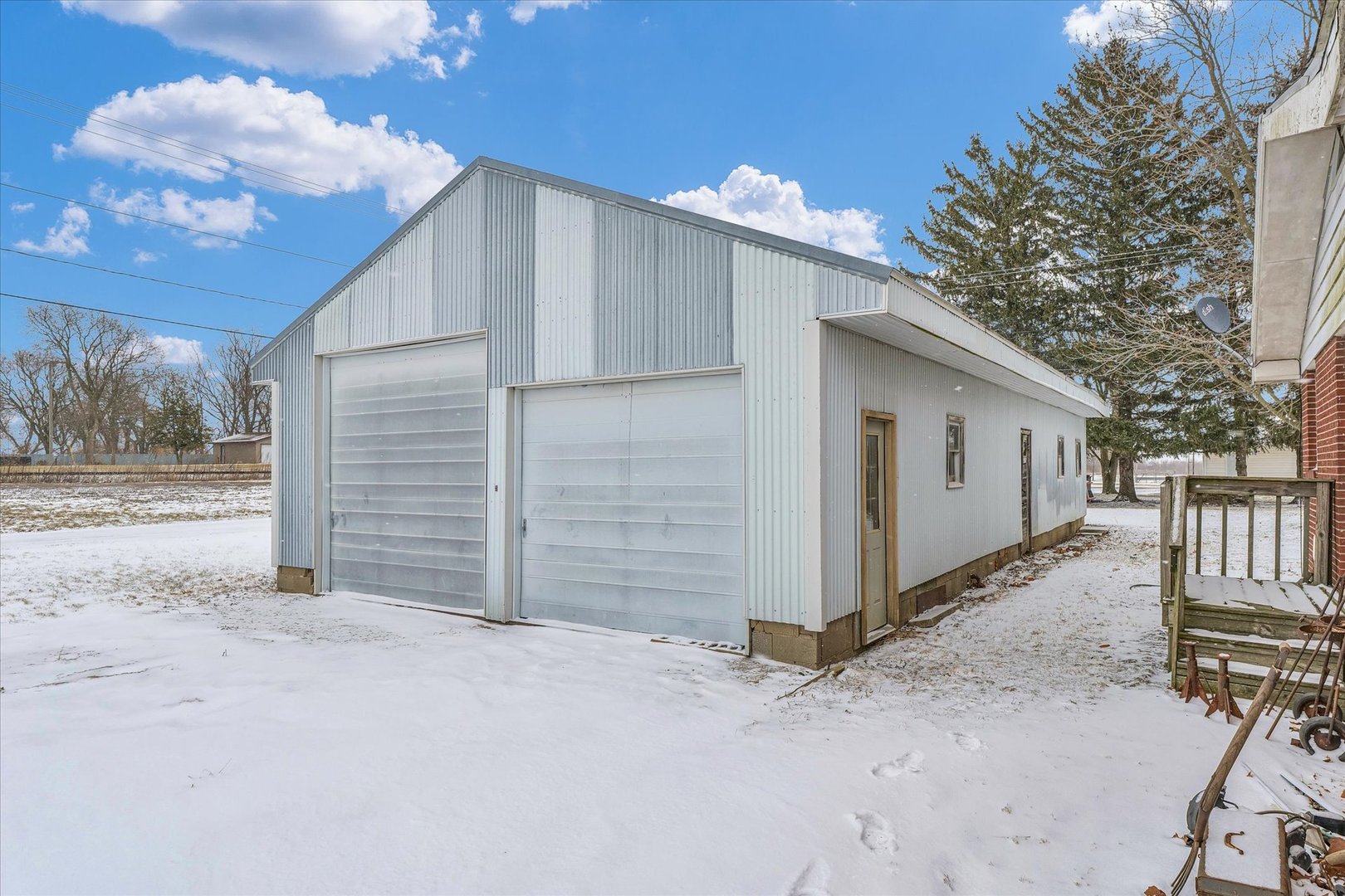 103 South Walnut Street Arrowsmith, IL 61722 - Photo 35 of 39 a view of a house with a yard and garage