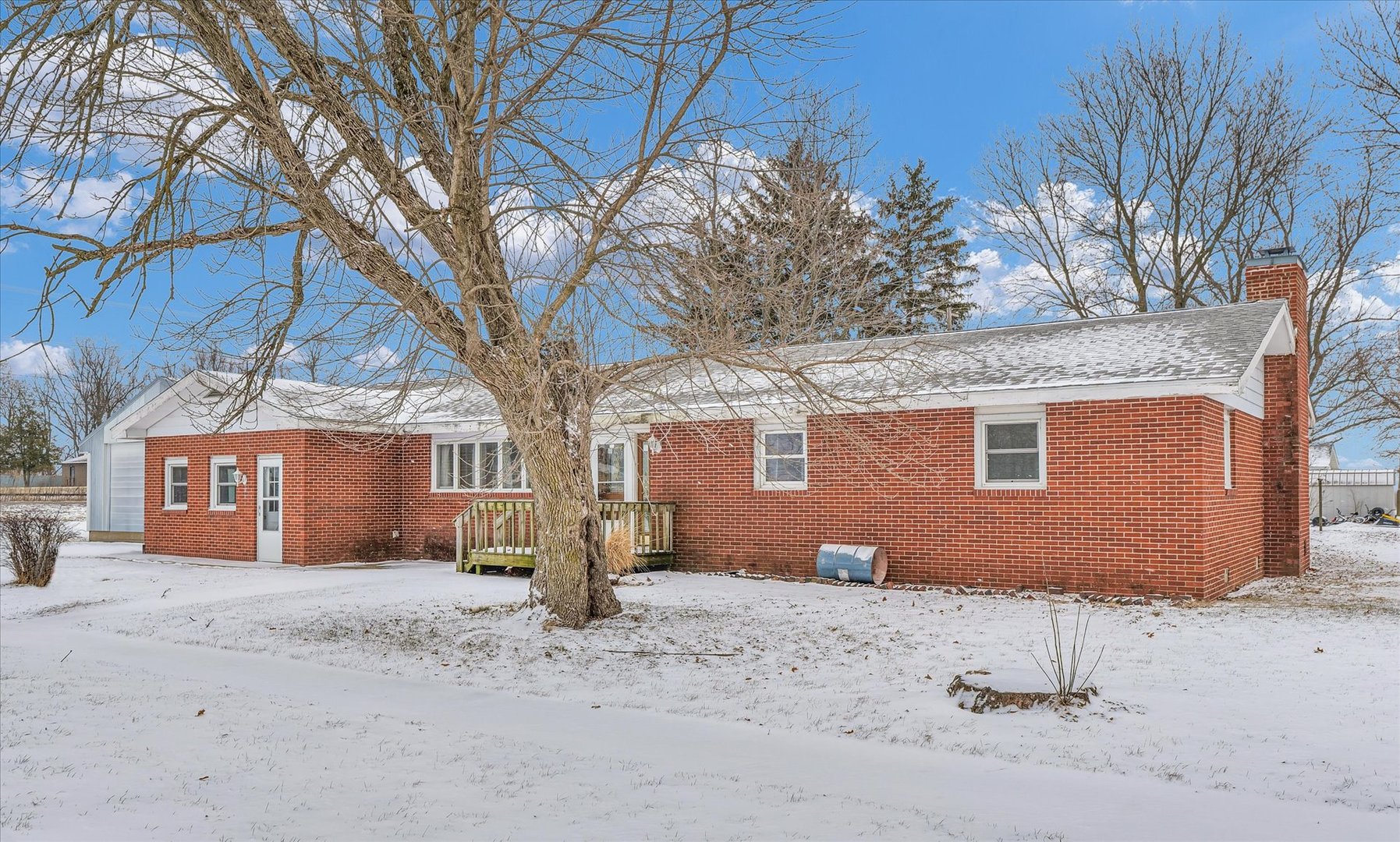 103 South Walnut Street Arrowsmith, IL 61722 - Photo 37 of 39 a front view of a house with a yard and garage