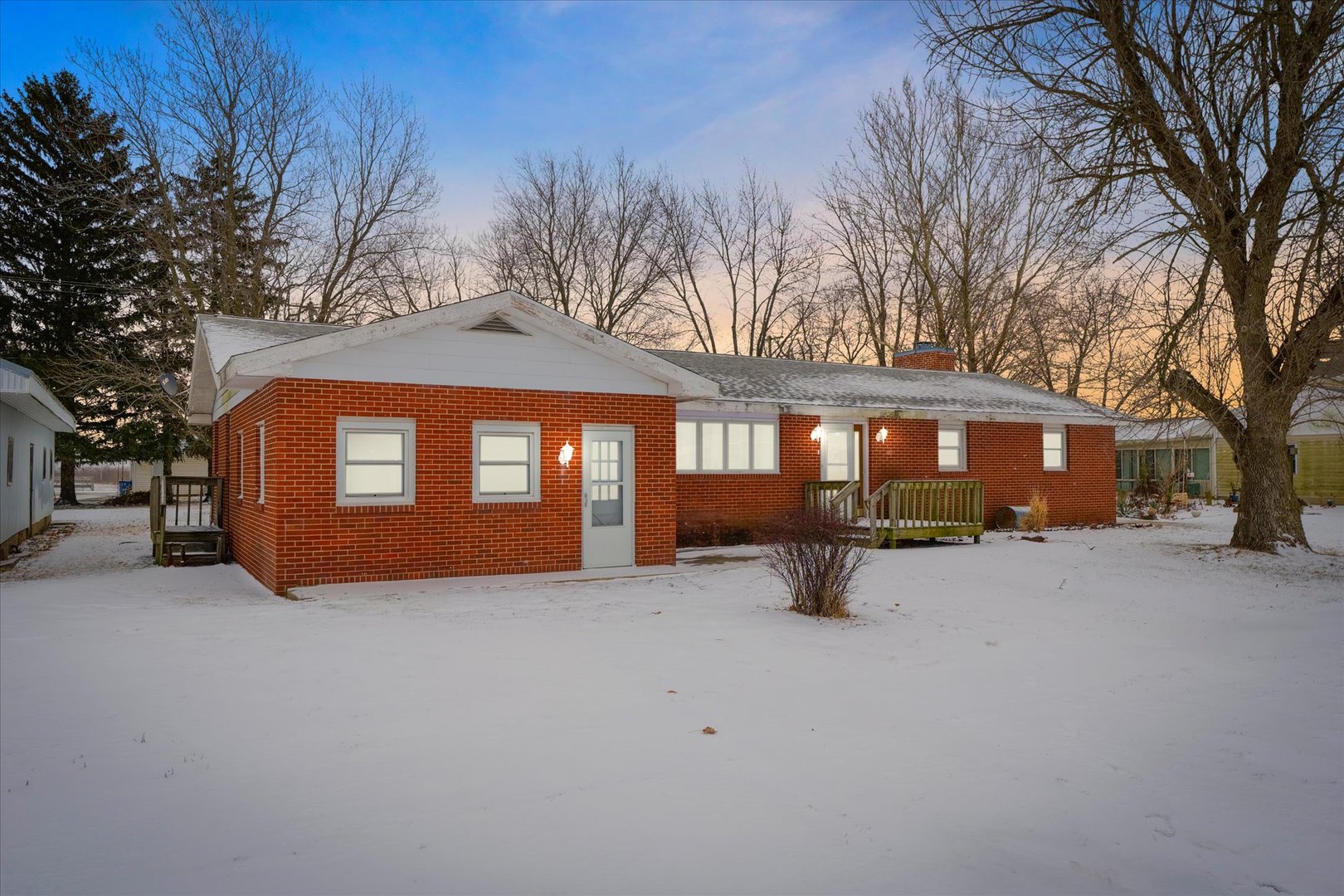 103 South Walnut Street Arrowsmith, IL 61722 - Photo 6 of 39 a view of a house with a yard covered in snow