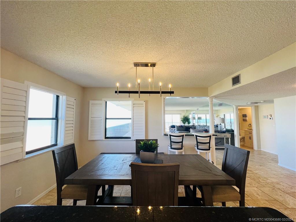 Undisclosed Address Jensen Beach, FL 34957 - Photo 15 of 86 a view of a dining room with furniture and window