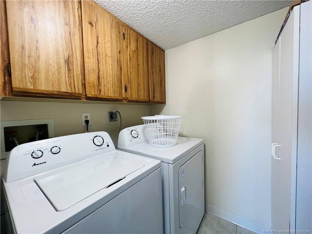 Undisclosed Address Jensen Beach, FL 34957 - Photo 66 of 86 a utility room with dryer and washer