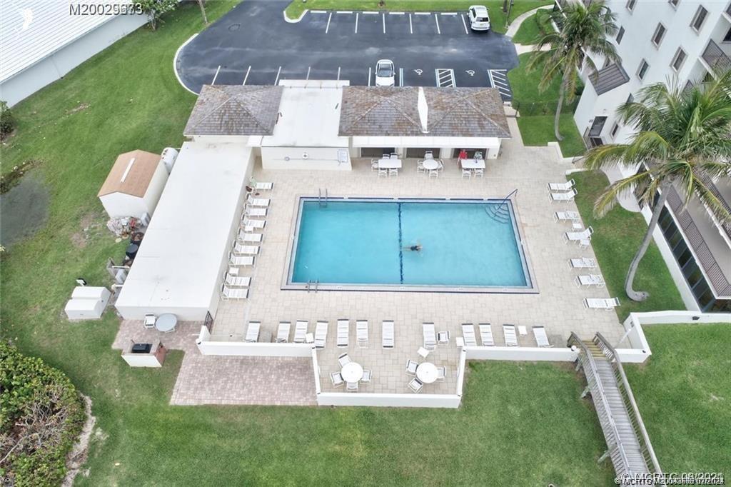 Undisclosed Address Jensen Beach, FL 34957 - Photo 73 of 86 an aerial view of a house with a garden