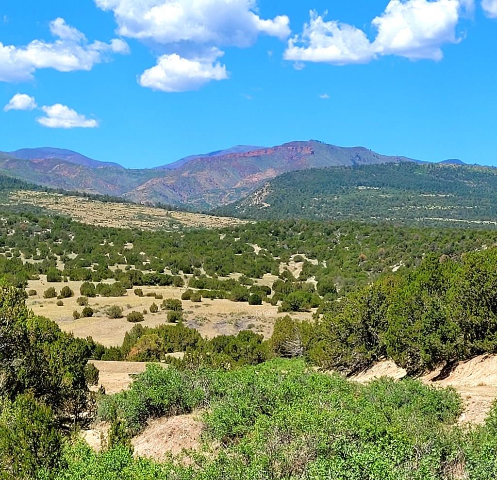 2915 Siloam Road Pueblo, CO 81005 - Photo 2 of 14 a view of a city with mountains in the background