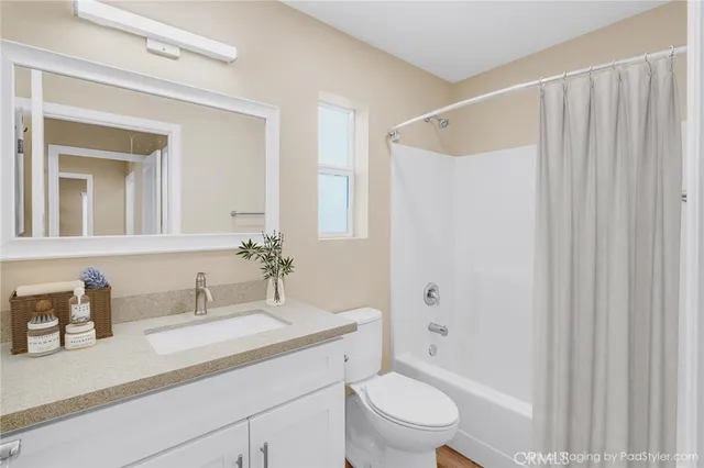 a bedroom with a bed and a chair