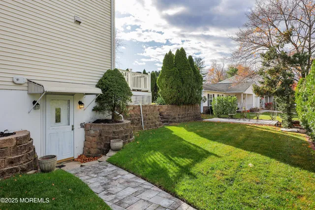 a bedroom with a bed chair and window