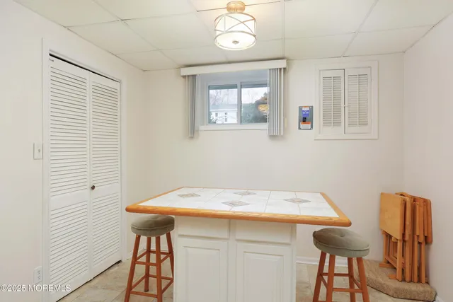 a kitchen with stainless steel appliances a refrigerator sink and cabinets