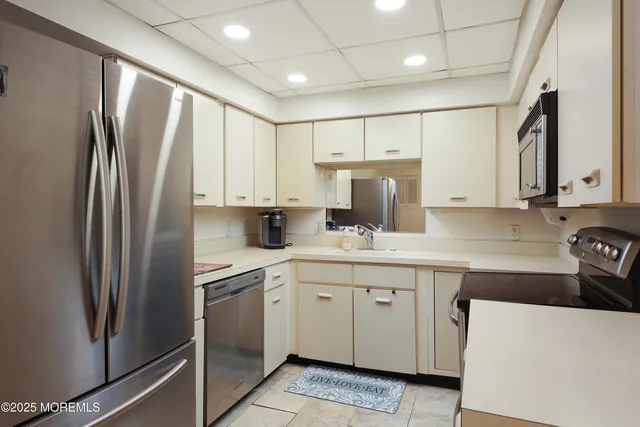 a bathroom with a sink a vanity and a mirror