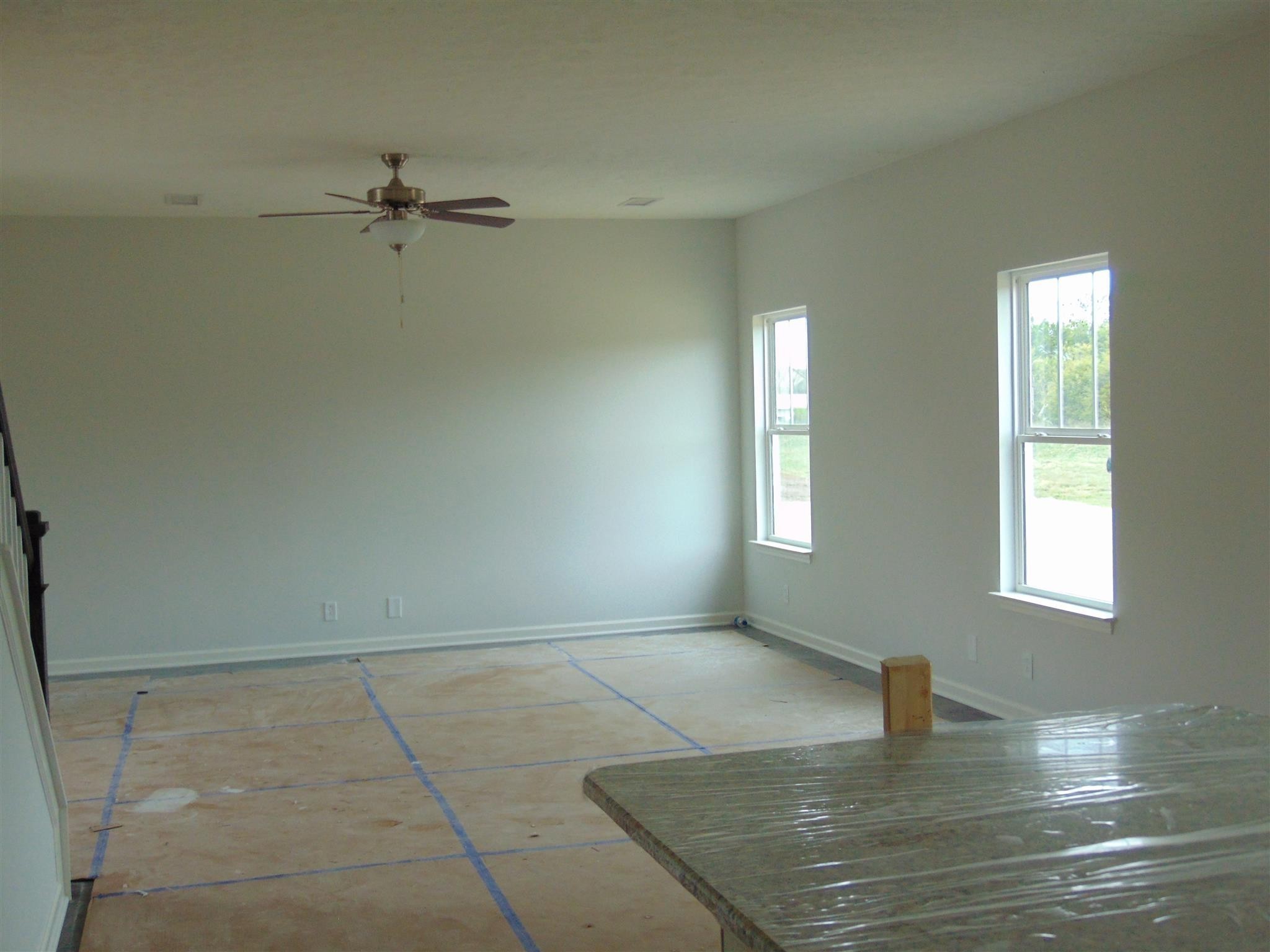 285 Spring Street La Vergne, TN 37086 - Photo 4 of 12 a view of empty room with window and hardwood floor