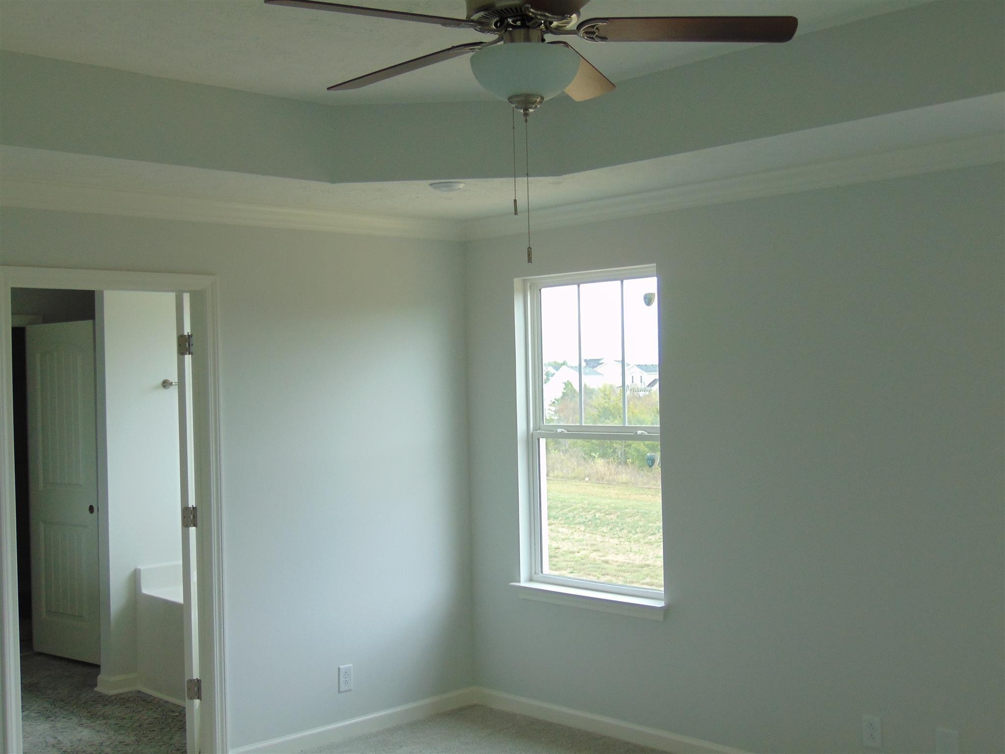 285 Spring Street La Vergne, TN 37086 - Photo 7 of 12 a view of an empty room with a window