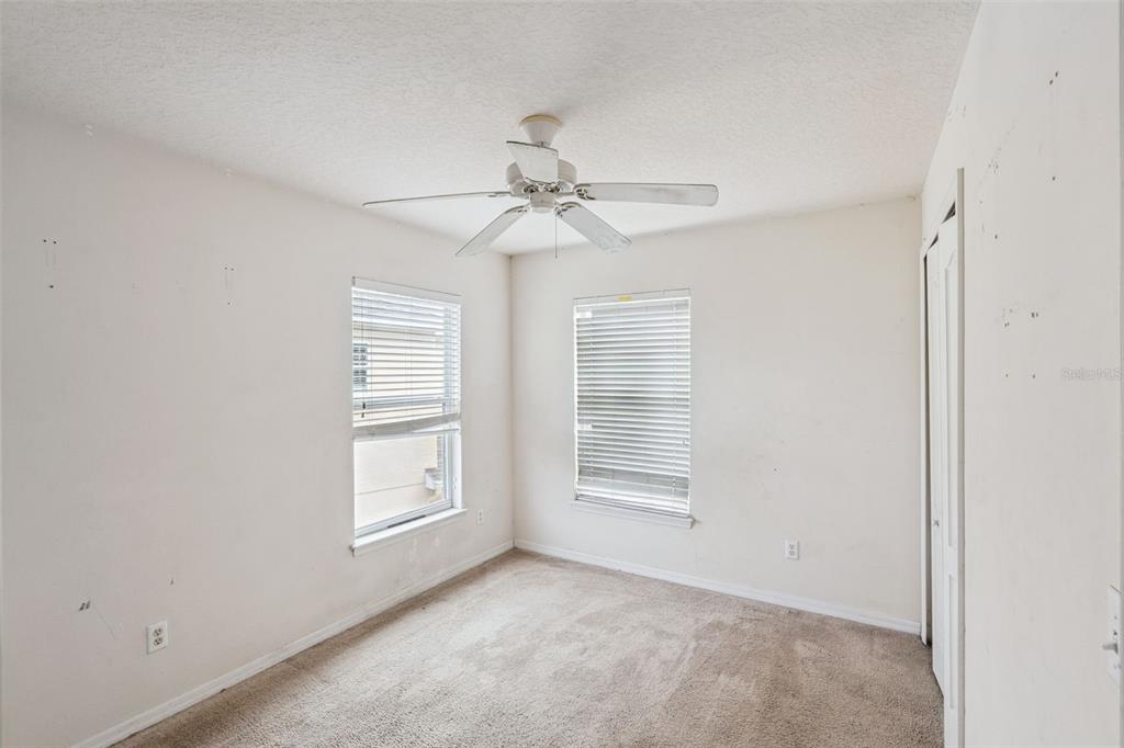 1755 Royal Ridge Drive Davenport, FL 33896 - Photo 11 of 25 a view of an empty room with a window