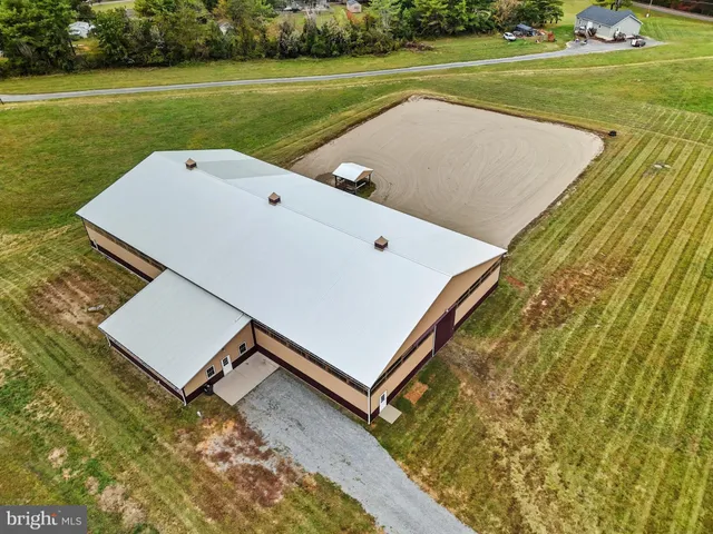 a view of kitchen with wooden floor and window