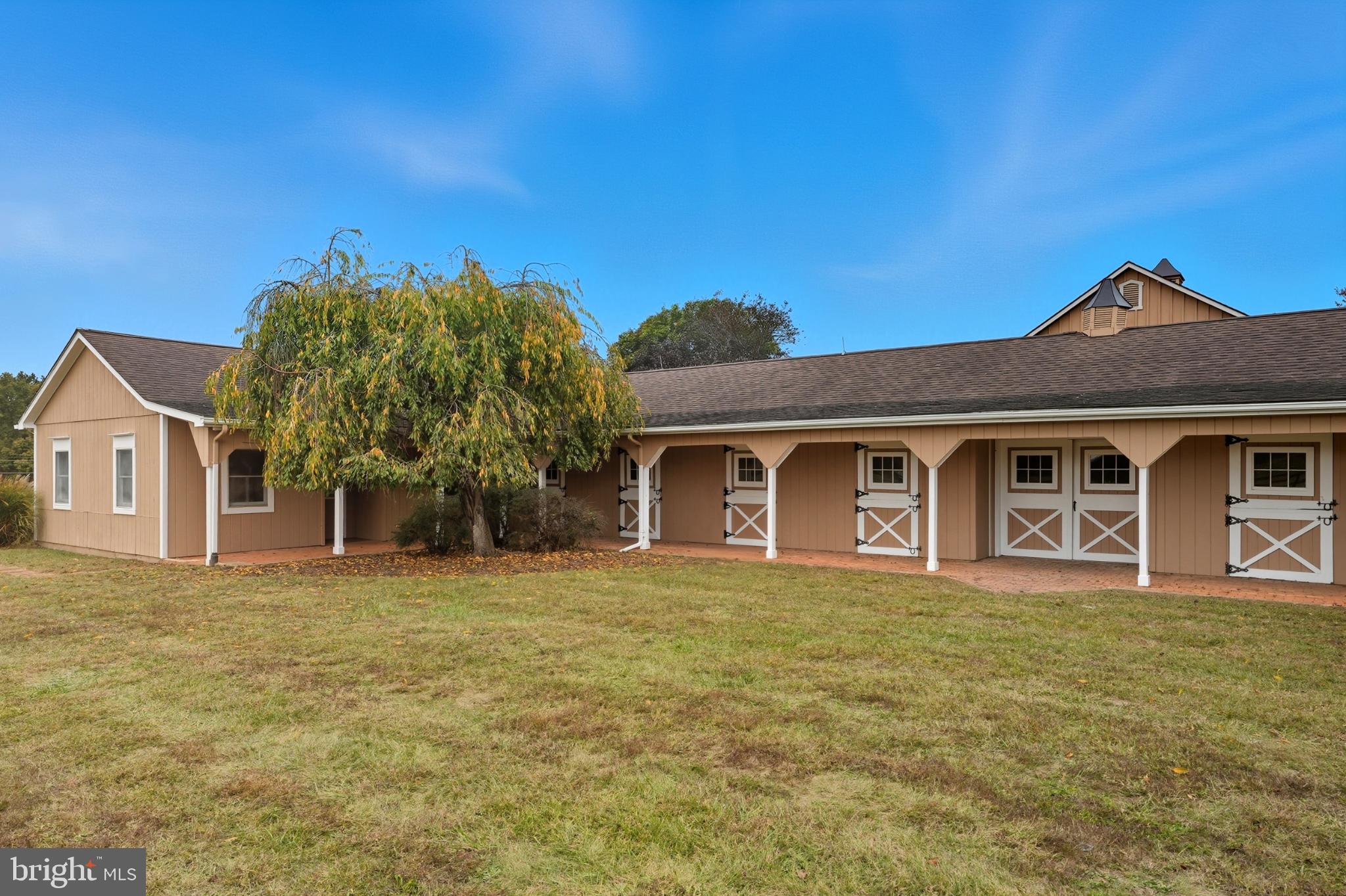 8021 Olympic Way Culpeper, VA 22701 - Photo 31 of 78 a front view of a house with a yard