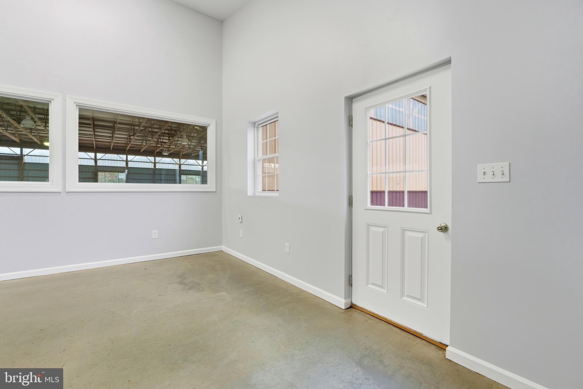 8021 Olympic Way Culpeper, VA 22701 - Photo 68 of 78 an empty room with windows
