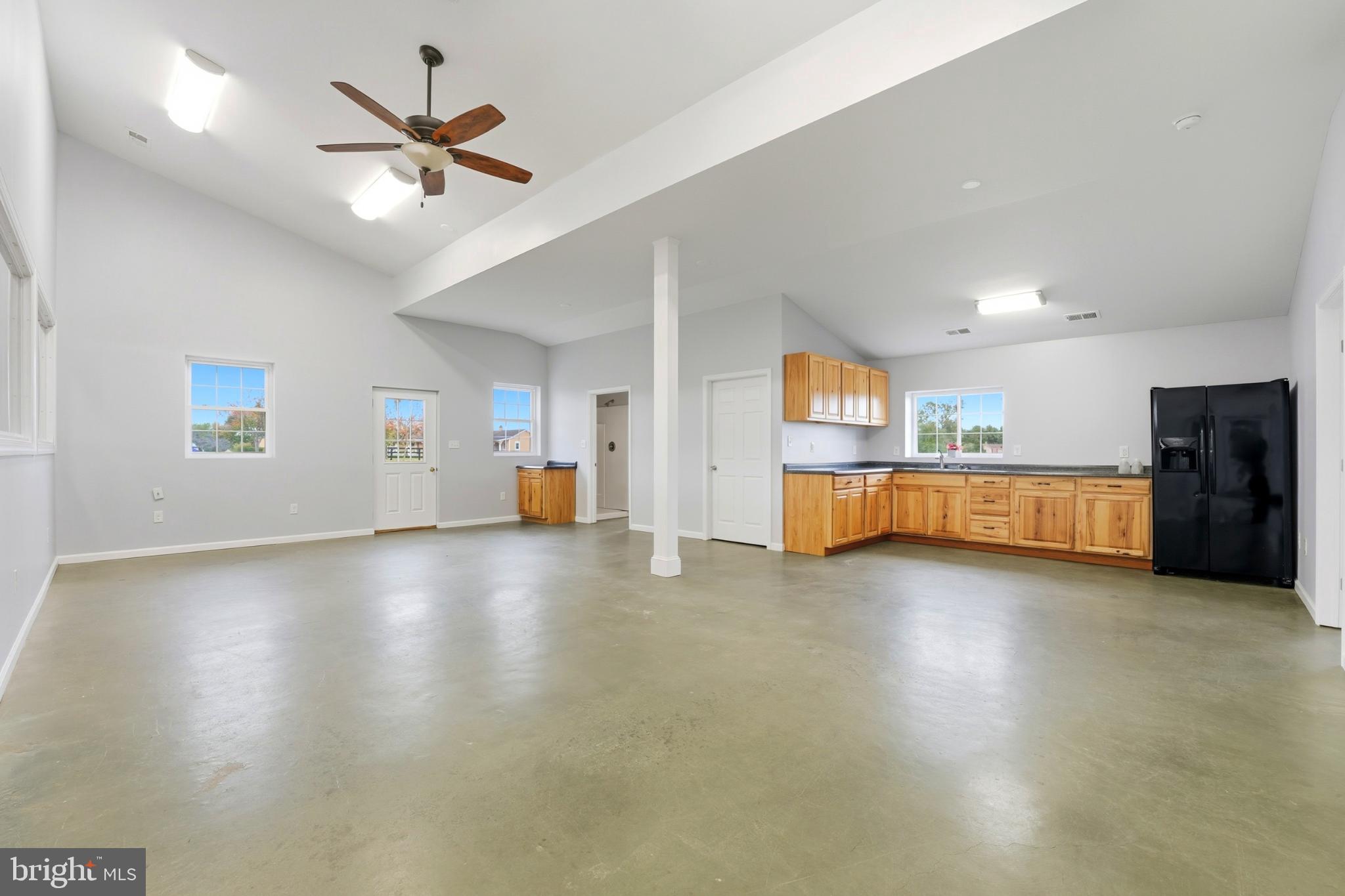 8021 Olympic Way Culpeper, VA 22701 - Photo 72 of 78 a view of an empty room with a window and wooden floor