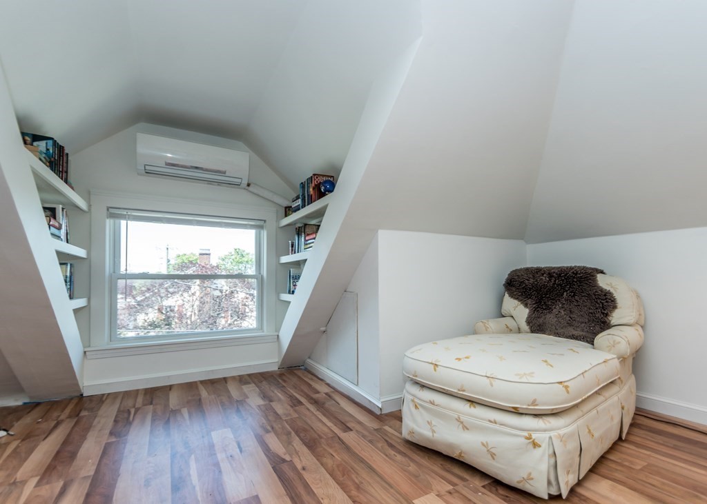 16 Hamblin Road, Unit 2 Waltham, MA 02453 - Photo 15 of 29 a living room with furniture and a large window