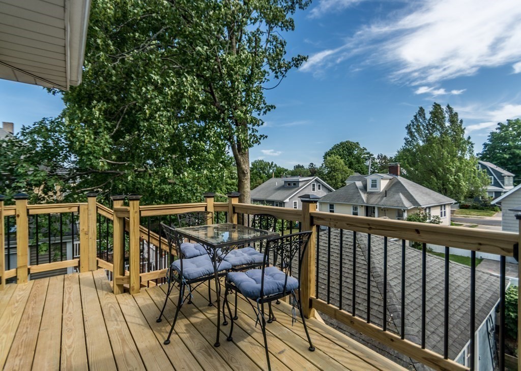 16 Hamblin Road, Unit 2 Waltham, MA 02453 - Photo 25 of 29 a view of a balcony with chairs