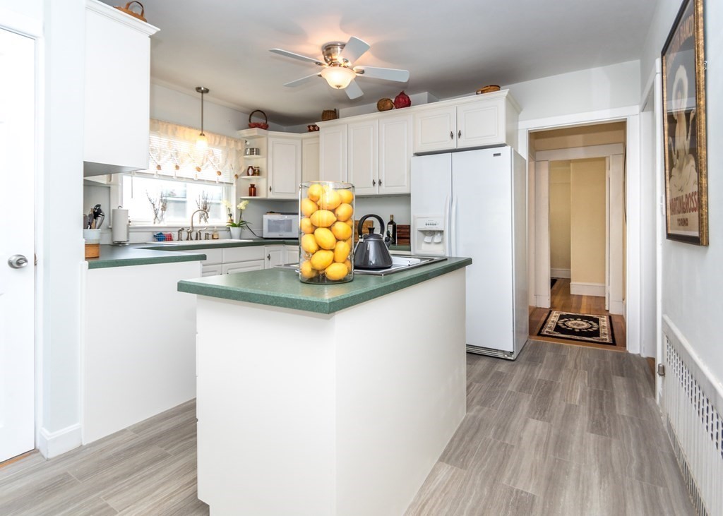 16 Hamblin Road, Unit 2 Waltham, MA 02453 - Photo 6 of 29 a kitchen with a sink appliances and cabinets