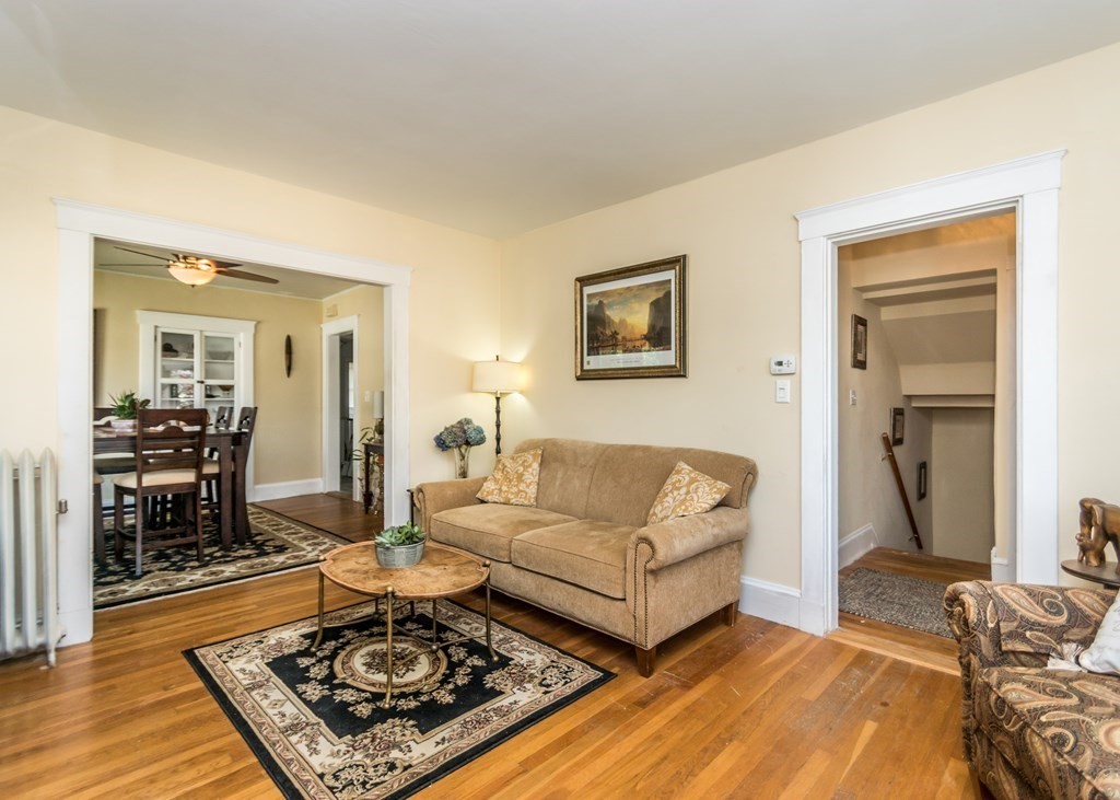16 Hamblin Road, Unit 2 Waltham, MA 02453 - Photo 10 of 29 a living room with furniture and a rug