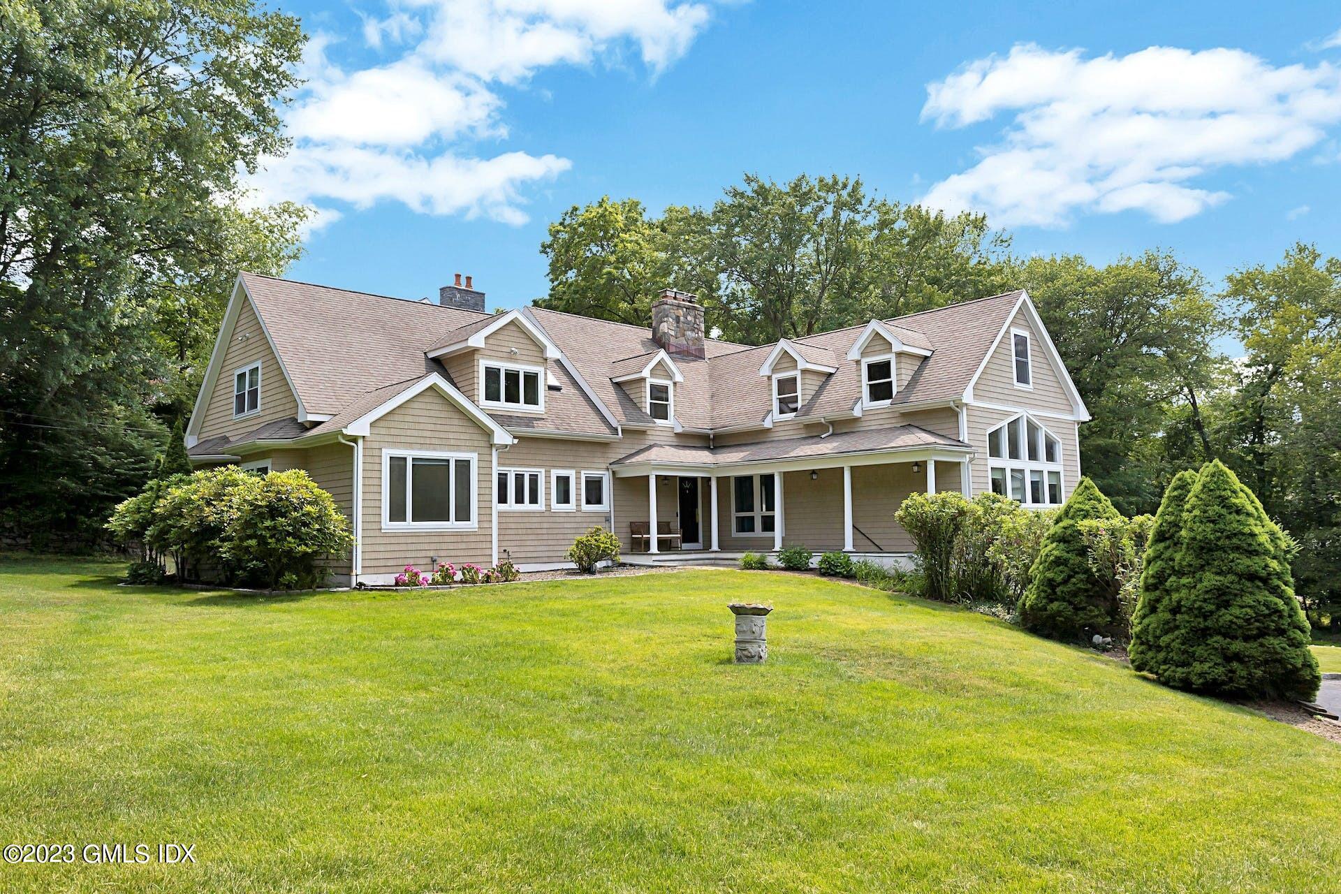 396 Westover Road Stamford, CT 06902 - Photo 3 of 39 a front view of house with yard and green space