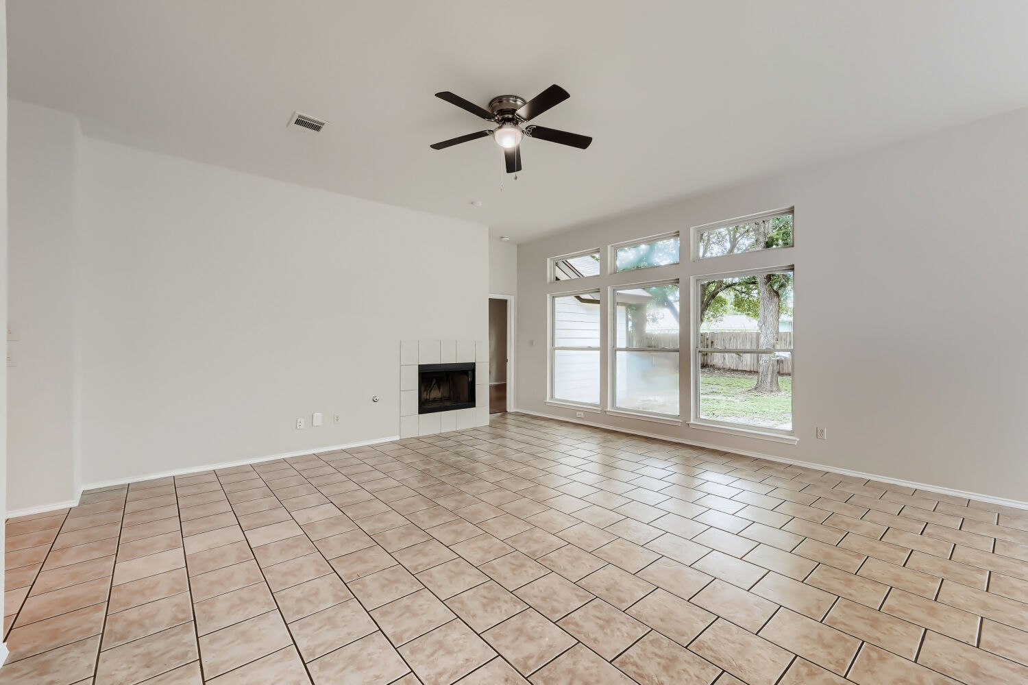 119 Stephen Lane Georgetown, TX 78626 - Photo 7 of 32 Tall ceilings, floor to ceiling windows in this space make it feel like an extension of outdoors.