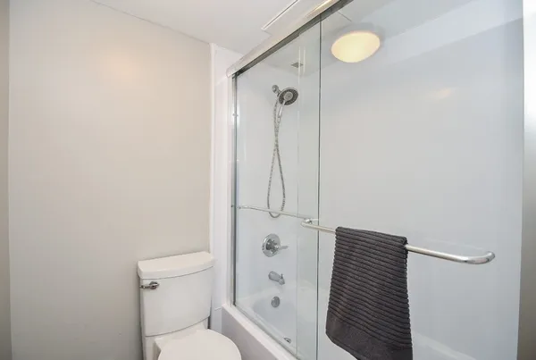 a kitchen with stainless steel appliances a sink and cabinets