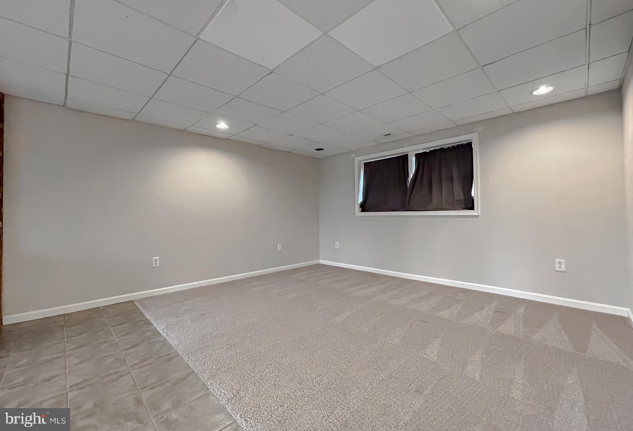 11106 Rawhide Road Lusby, MD 20657 - Photo 33 of 40 Lower Level Family Room