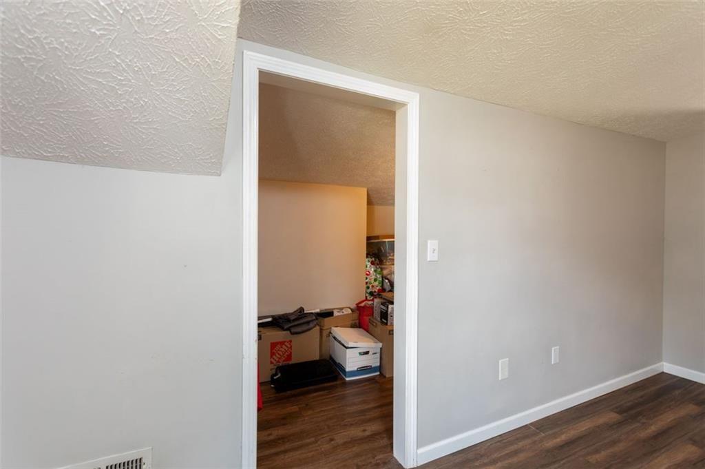 255 East 2nd Street Northeast Rome, GA 30161 - Photo 19 of 25 a room that has a bed in it