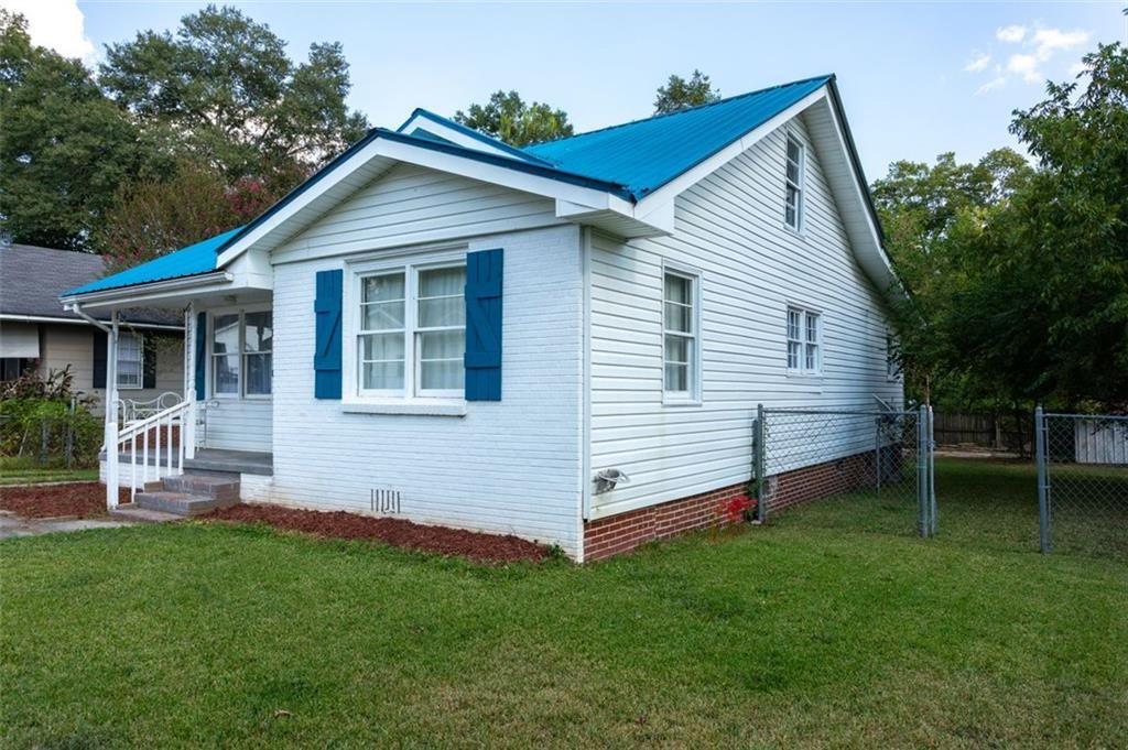 255 East 2nd Street Northeast Rome, GA 30161 - Photo 2 of 25 a view of a house with a backyard