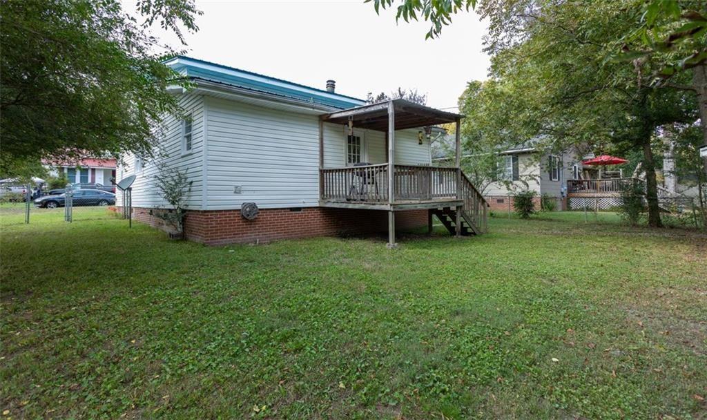 255 East 2nd Street Northeast Rome, GA 30161 - Photo 22 of 25 a view of a house with a backyard
