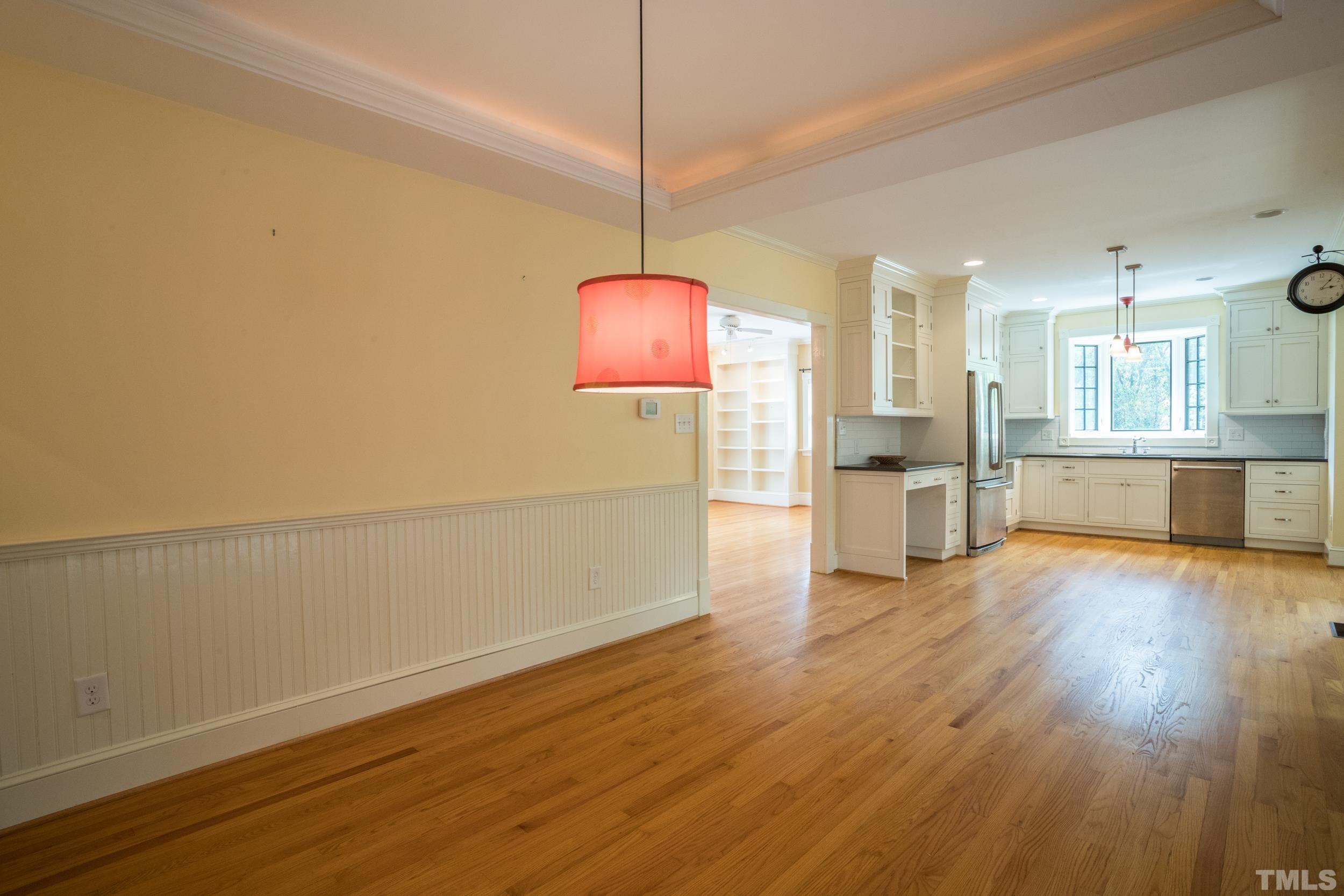 1903 Alexander Road Raleigh, NC 27608 - Photo 12 of 26 a view of a room with wooden floor and a window
