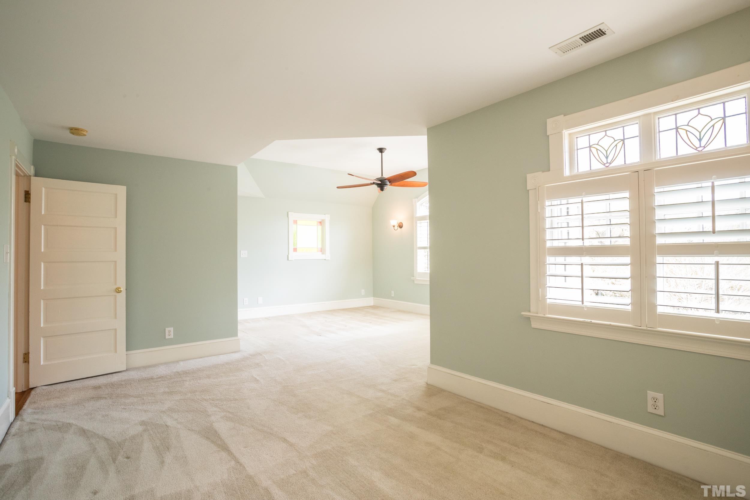 1903 Alexander Road Raleigh, NC 27608 - Photo 17 of 26 a view of an empty room with a window