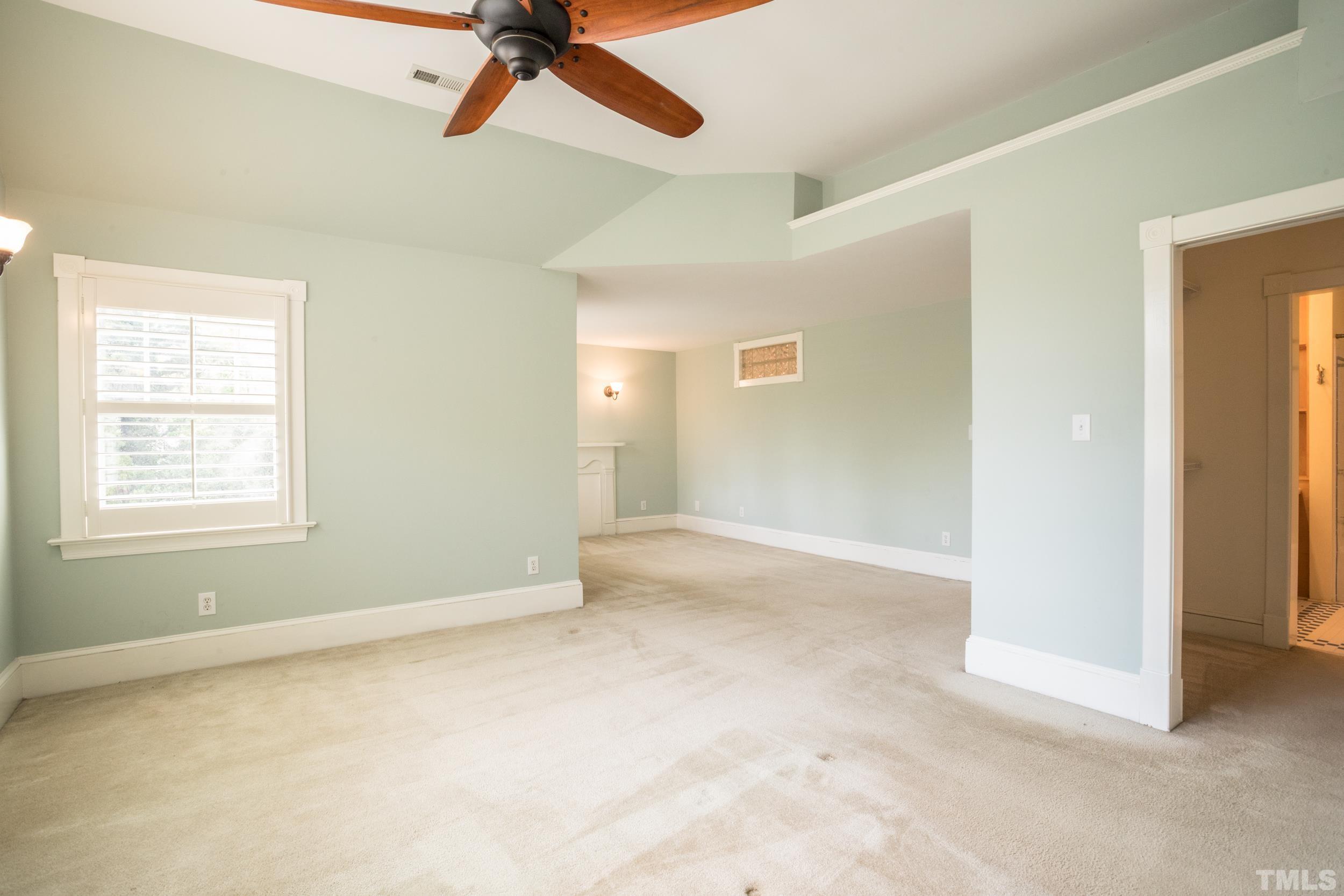 1903 Alexander Road Raleigh, NC 27608 - Photo 18 of 26 a view of an empty room with a window